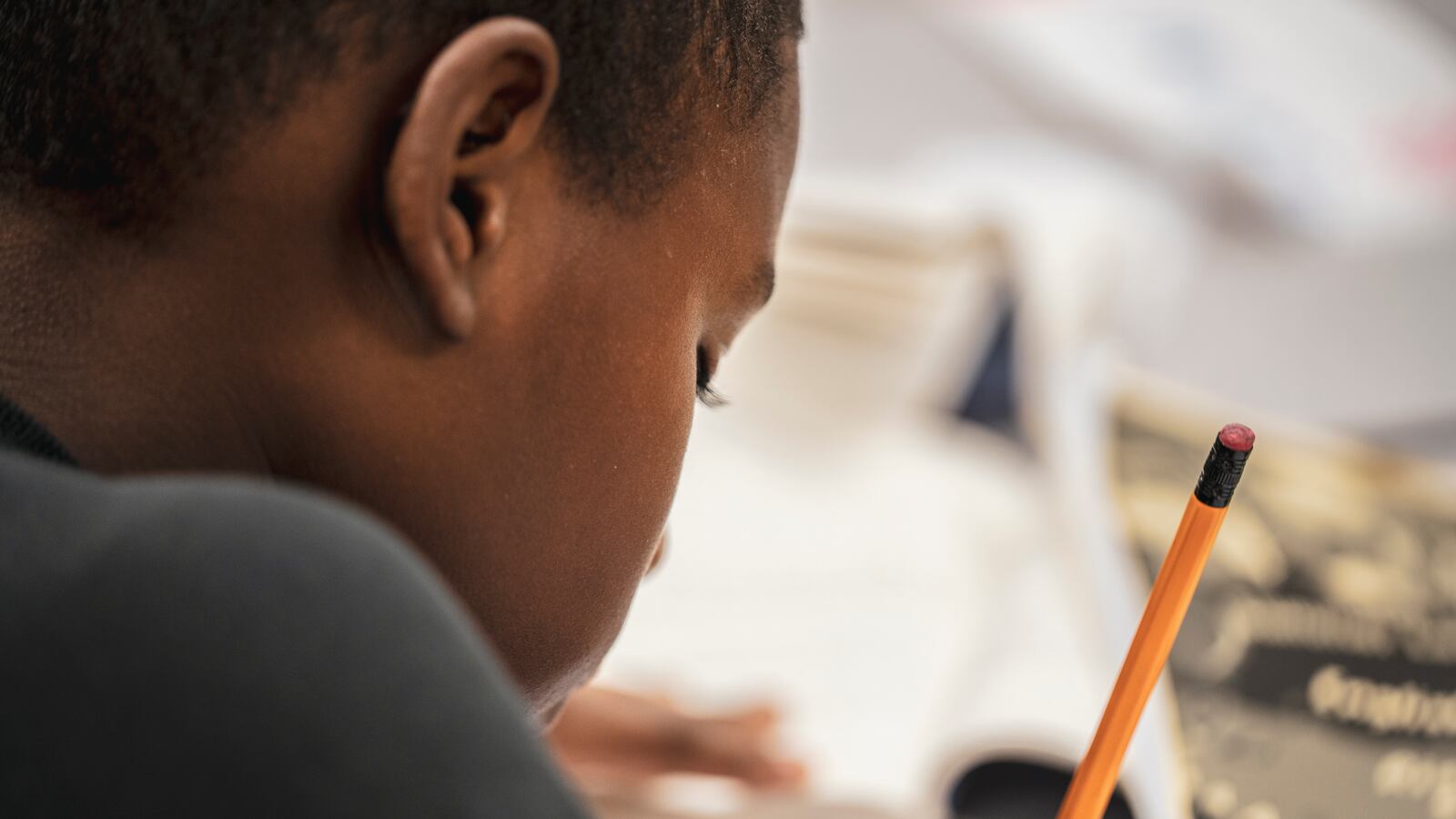 student studying with pencil